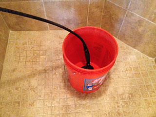 Photo of bucket in shower