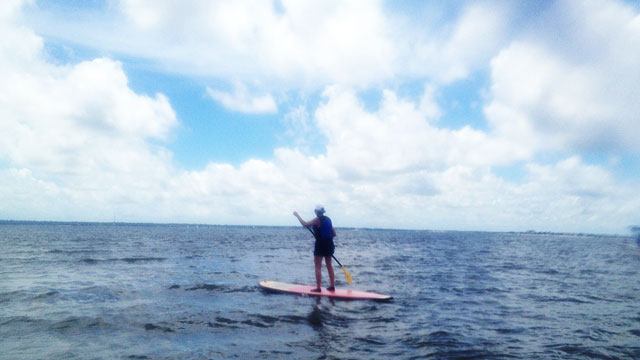 Debbie paddleboarding on Shem Creek