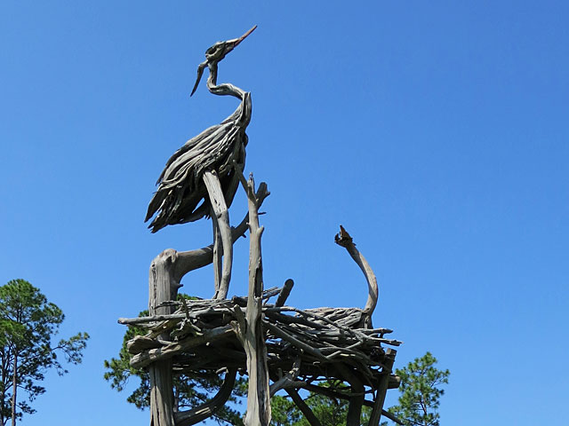 Driftwood sculpture of nesting birds