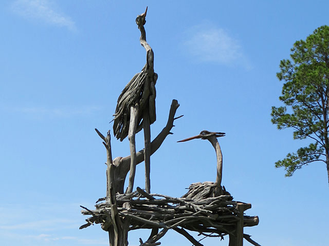 Driftwood sculpture of nesting birds