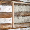 Photo - detail of log cabin wall