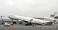 A.P. Photo - Plane with nose tipped up