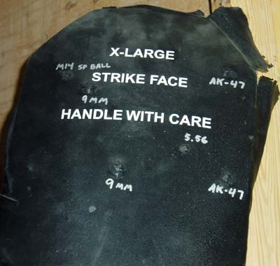 Body armor showing effect of various round strikes