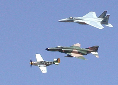 Photo - Vintage & Modern Warplanes flying together