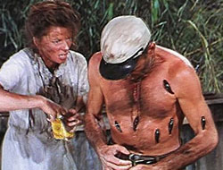 Scene from The African Queen - Humphrey Bogart covered with leeches