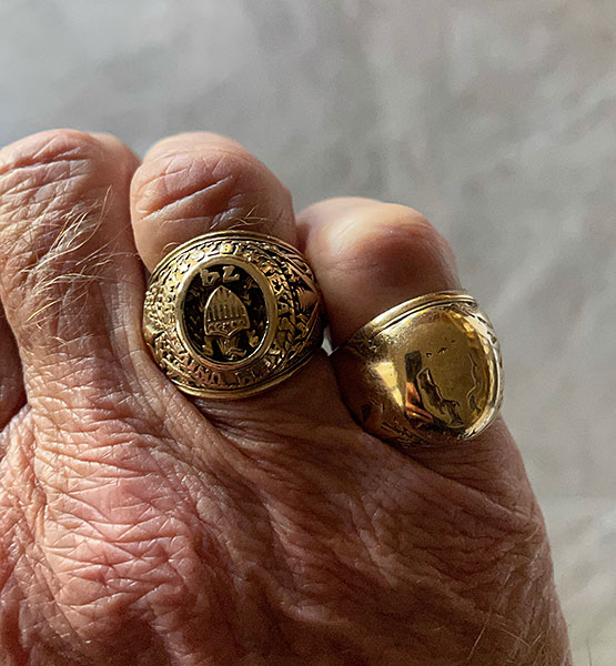 Photo - My hand sporting two Texas A&M class rings, one from 1974 and another from 1949