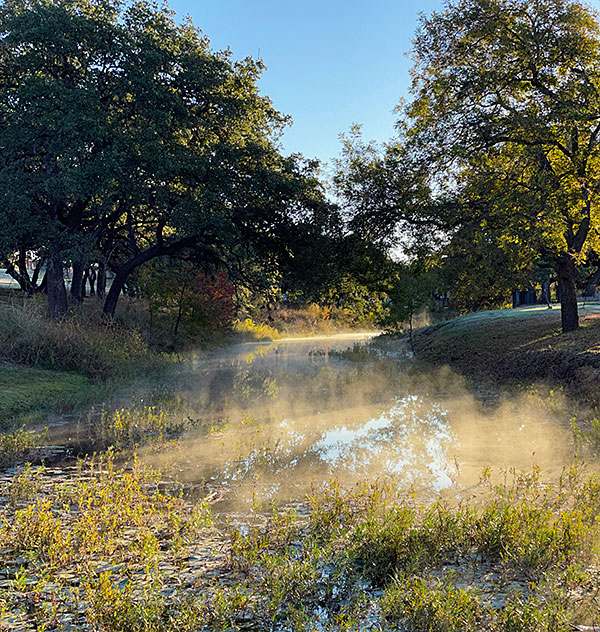 Photo - Steam rising from the surface of Pecan Creek