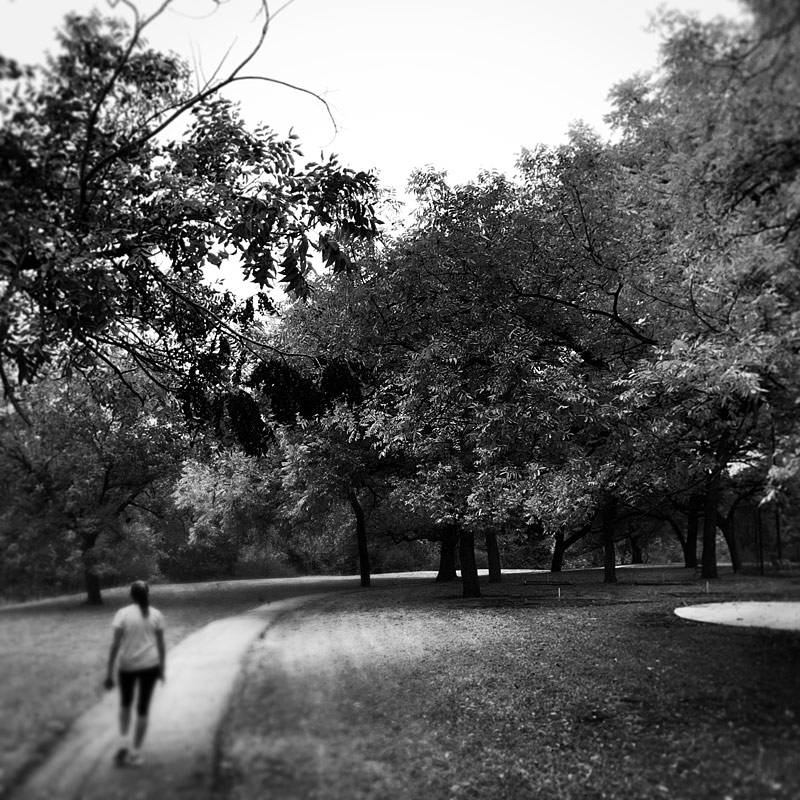 Photo - My wife walking down a trail in the woods