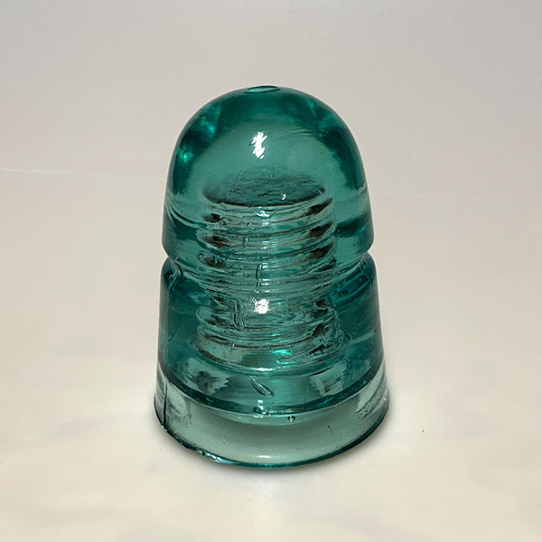 Photo - Green glass insulator