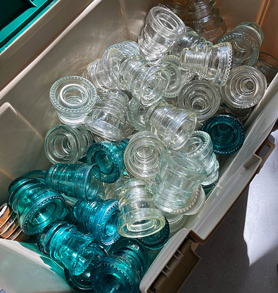 Photo - Glass insulators in storage bin