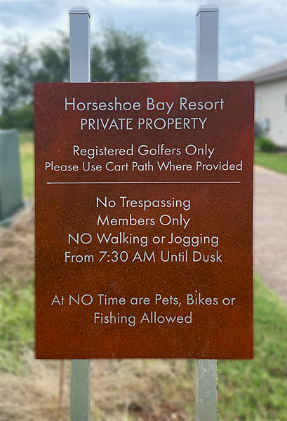 Photo - Sign on golf course prohibiting use of cart paths by anyone but golfers