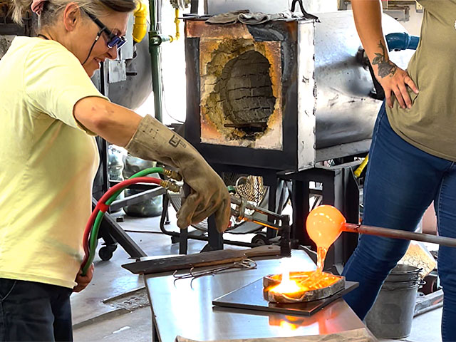 Photo: Pouring the clear glass over the colored pieces