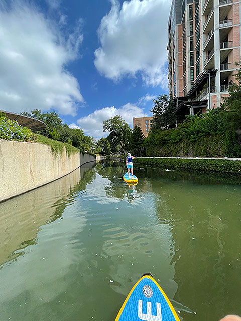Photo: Paddleboarding on the Museum Reach of the Riverwalk in San Antonio, Texas