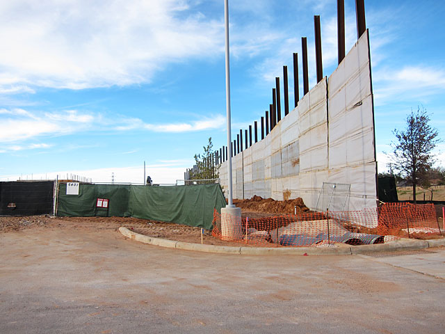 Photo of sound barrier in front of building site