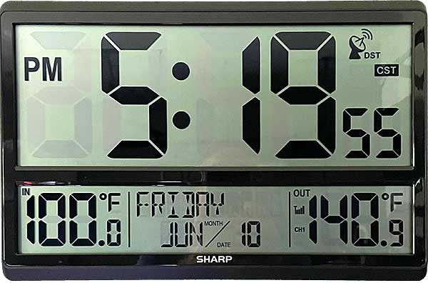 Photo: Indoor/Outdoor Thermometer showing insane temps