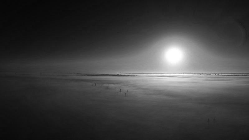 Sunrise above the fog in Horseshoe Bay, Texas (black and white photo)