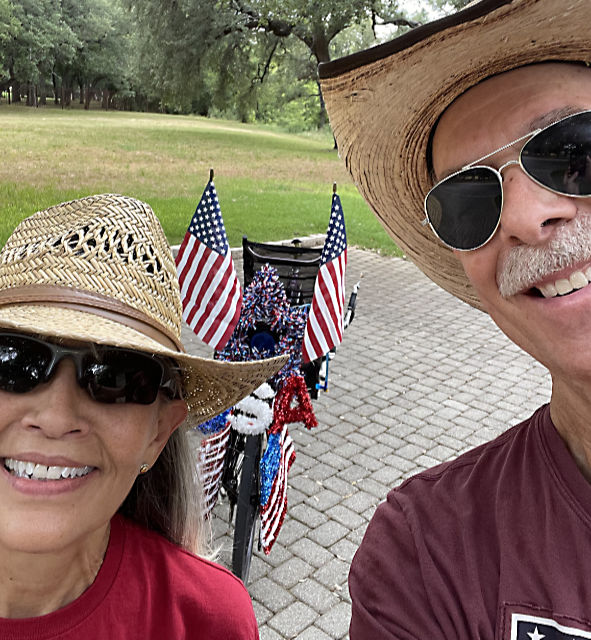 Photo: Debbie and I in front of our decorated recumbent tandem bicycle