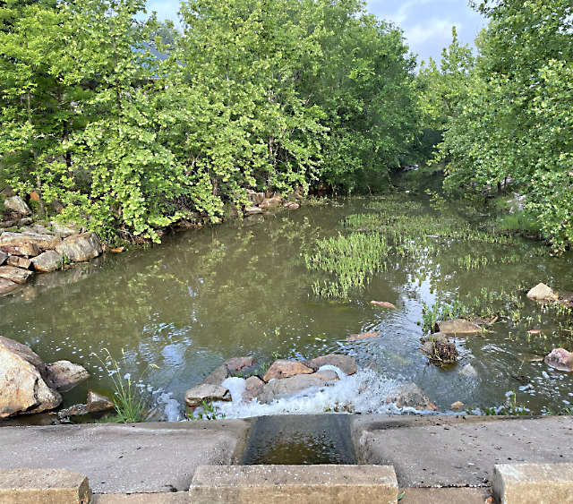 Photo: Rushing water through the creek's spillway