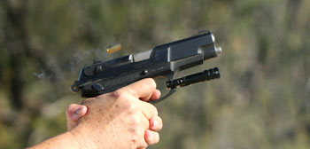 Photo - flying 9mm ammo cartridge